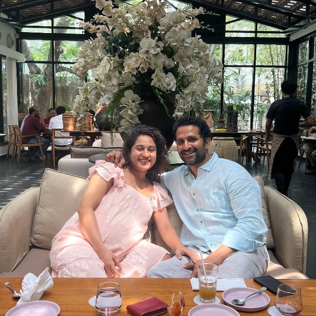 Pooja Ramachandran as seen while smiling in a picture along with John Kokken during a lunch date at a restaurant in 2023