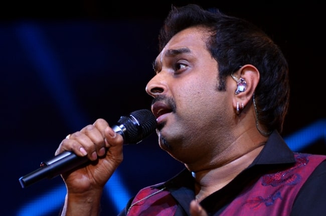 Shankar Mahadevan as seen while performing with Shankar-Ehsaan-Loy trio at Idea Rocks India concert at NICE Grounds in Bangalore, Karnataka in 2013