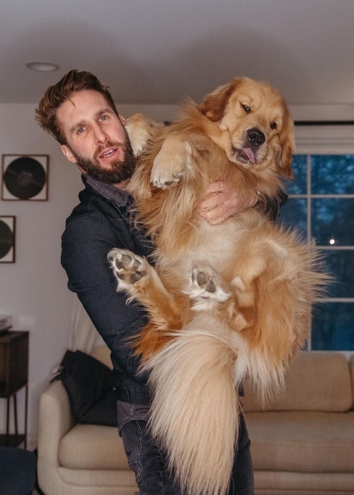 Shawn Booth as seen in a picture with his dog Walter in March 2022
