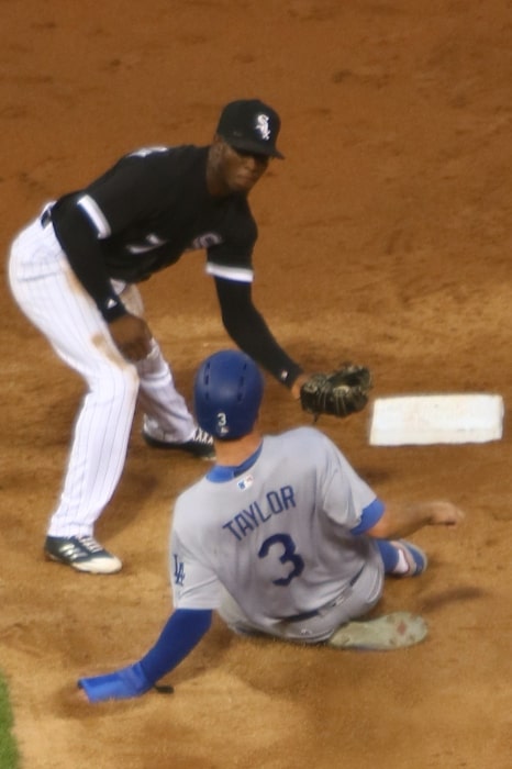 Tim Anderson as seen while playing for the 2017 Chicago White Sox and tagging out Chris Taylor of the 2017 Los Angeles Dodgers