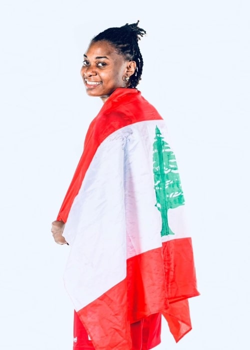 Trinity Baptiste in a picture taken in June 2023, with the Lebanese flag after being chosen to represent the country with the Lebanese Women’s National Team at the 2023 FIBA Women's Asia Cup