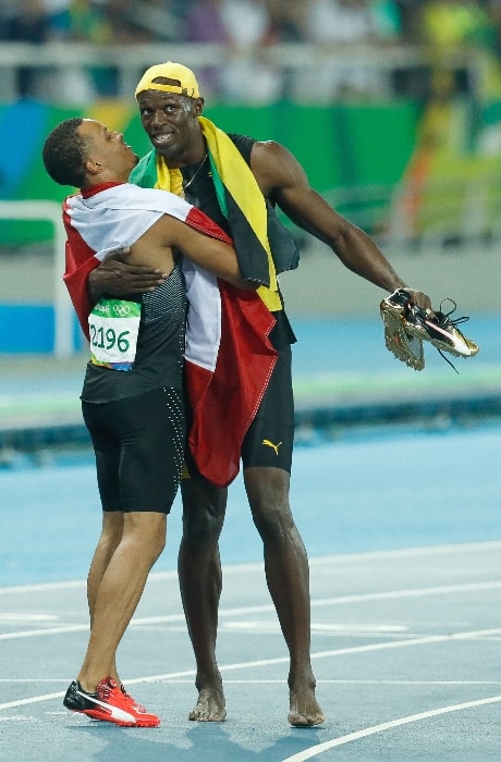 Andre De Grasse (Left) and Usain Bolt as seen after running the 100 m final at the 2016 Olympics