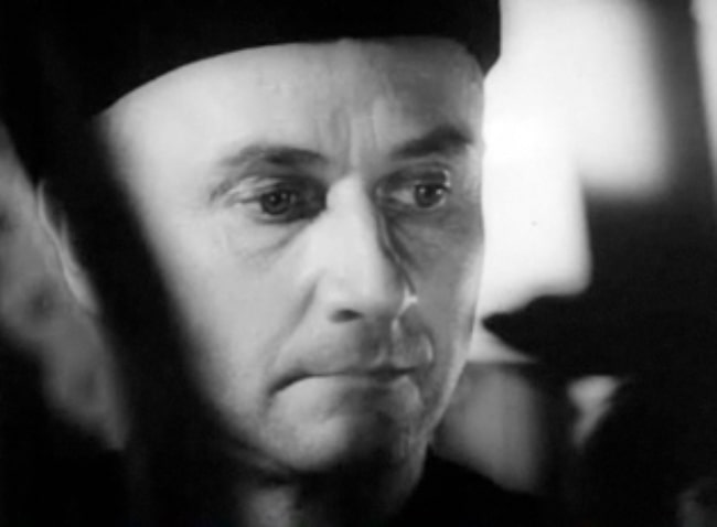 Donald Pleasence as seen in a black-and-white cropped screenshot from the trailer for the film 'Eye of the Devil'