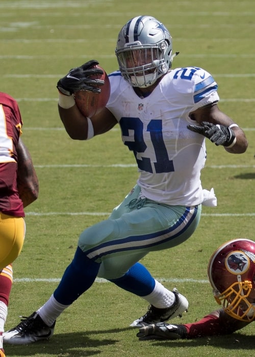 Ezekiel Elliott as seen while carrying the ball for the Dallas Cowboys during a game against the Washington Redskins at FedEx Field in Landover, Maryland on September 18, 2016