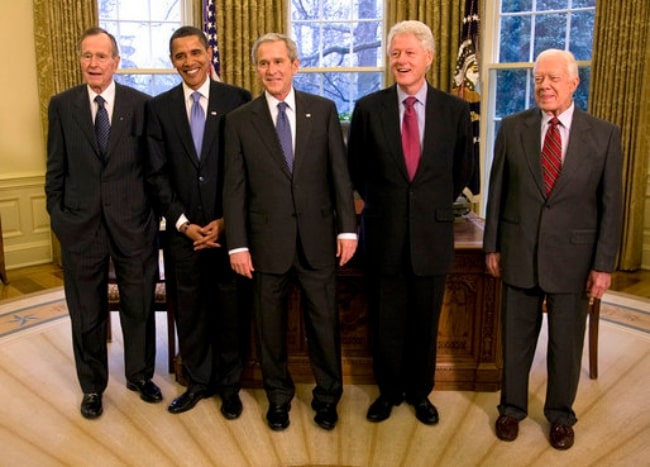 From Left to Right - George H. W. Bush, Barack Obama, George W. Bush, Bill Clinton, and Jimmy Carter posing for a picture during a Meeting and Lunch at The White House in 2009