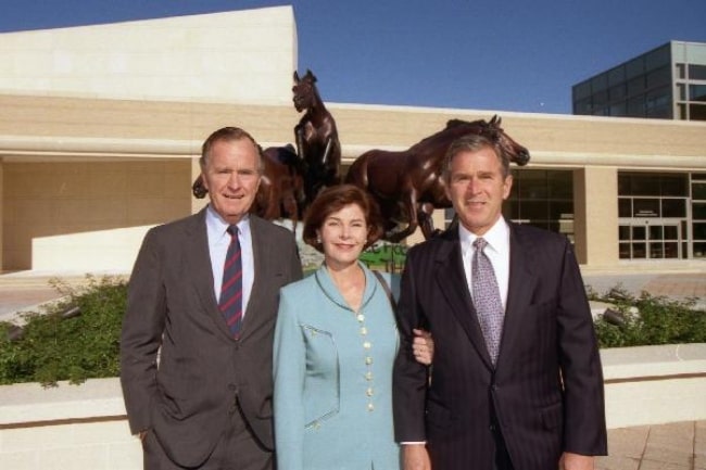 From Left to Right - former president George H. W. Bush, Laura Bush, and George W. Bush at the dedication of the George H.W. Bush Presidential Library and Museum in 1997
