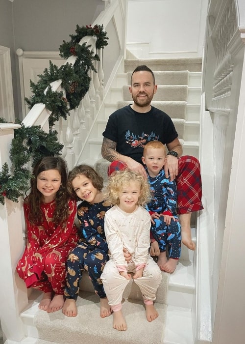 Jonathan Saccone-Joly as seen in a picture with his children in December 2021