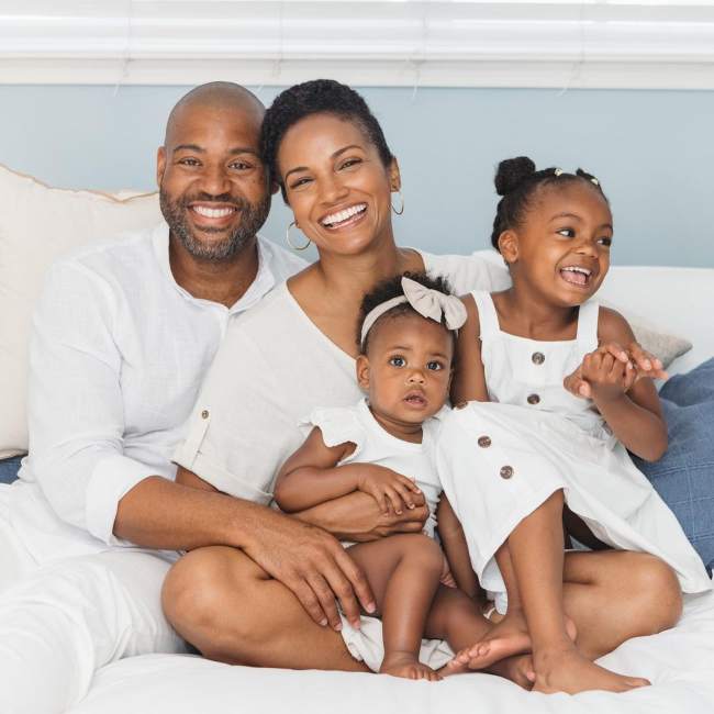 Mekia Cox as seen in an Instagram picture with her husband and daughters in May 2023
