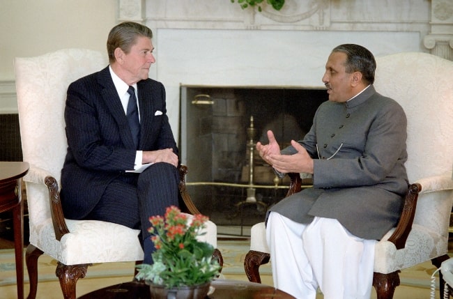 Ronald Reagan (Left) as seen during a meeting with President Mohammad Zia Ul Haq of Pakistan in Oval Office in December 1982