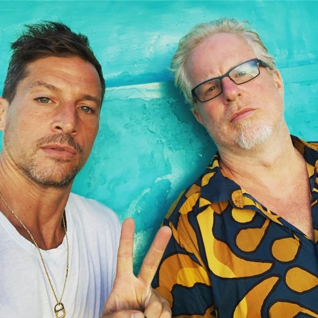 Simon Rex (Left) as seen while clicking a selfie with Christopher Ryan in January 2019