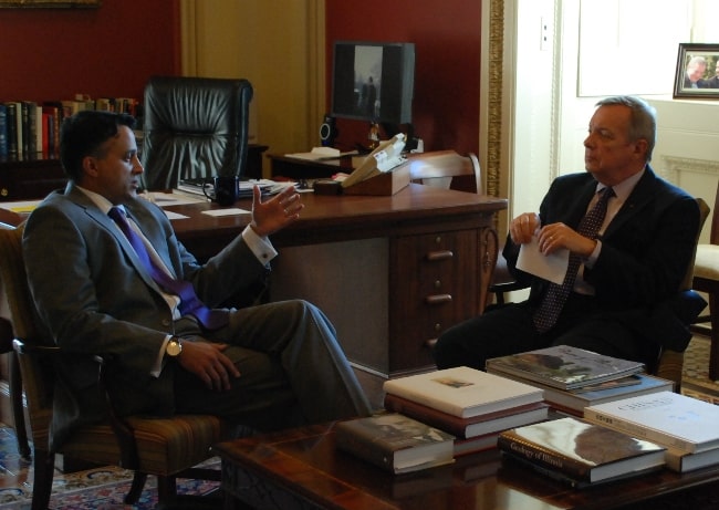 Dick Durbin (Right) pictured while meeting Raj Date, then acting director of the Consumer Financial Protection Bureau, to discuss helping consumers compare bank fees in 2011