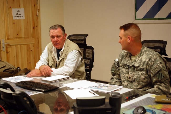 Jack Keane (Left) meeting with an army colonel in 2010