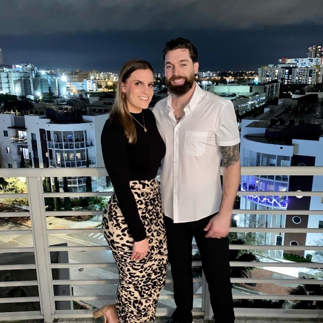 Jake Cave as seen while posing for a picture with his wife Saige in Tampa, Florida in February 2021