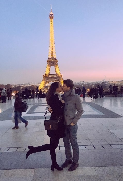 Jonathan Keltz and Laysla De Oliveira as seen while kissing in front of the Eiffel Tower in Paris, France