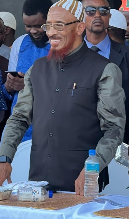 Khalid Yasin as seen while smiling during an event