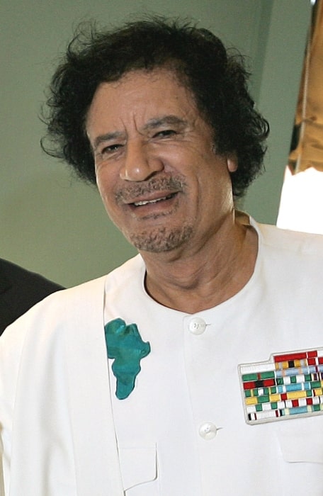 Muammar Gaddafi as seen while wearing an insignia showing the image of the African continent in 2006