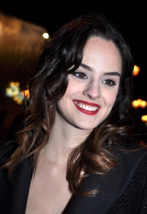 Noémie Merlant as seen while smiling for the camera during an event in 2013