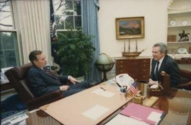 Pat Robertson (Right) as seen while meeting President George H. W. Bush in 1991