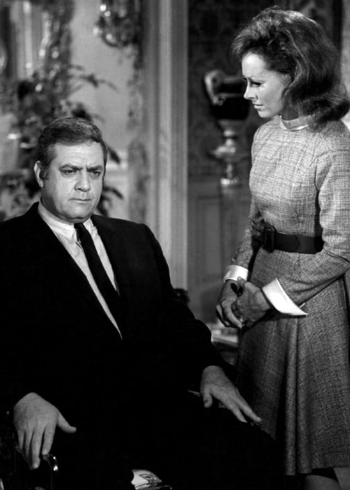 Raymond Burr as seen in a publicity photo with Victoria Shaw from the 'Ironside' television show, episode titled 'A Drug on the Market'