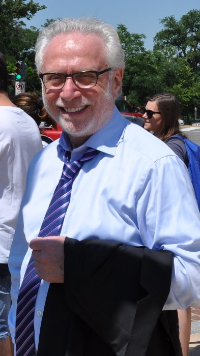 Wolf Blitzer as seen while smiling in a picture in June 2017