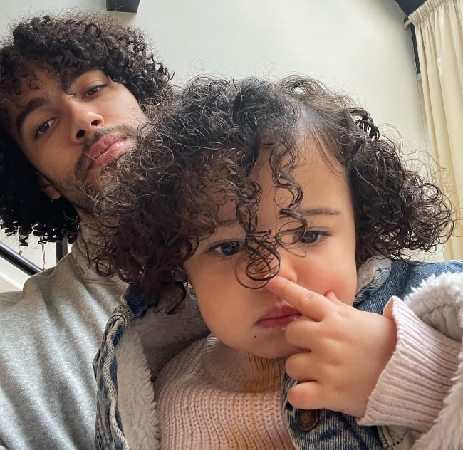 Xavier Cooks as seen in a selfie with his daughter in August 2022
