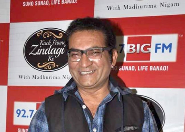 Abhijeet Bhattacharya as seen while smiling for the camera in 2014