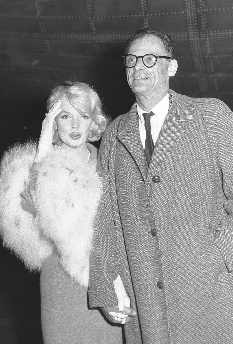 Arthur Miller as seen while accompanying his wife Marilyn Monroe as she arrives at International Airport from New York to start work on a 20th Century-Fox picture in 1959