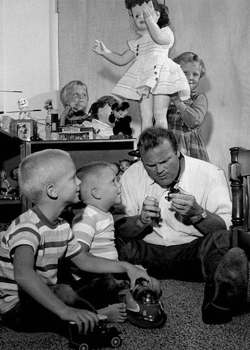 Dan Blocker as seen playing with his children in the 1960s