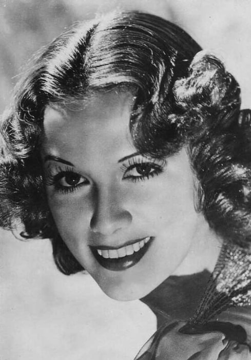 Eleanor Powell as seen while smiling in a publicity photo in the 1930s