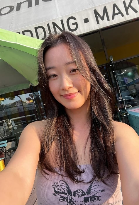 Gia Kim as seen while smiling in a selfie in July 2023