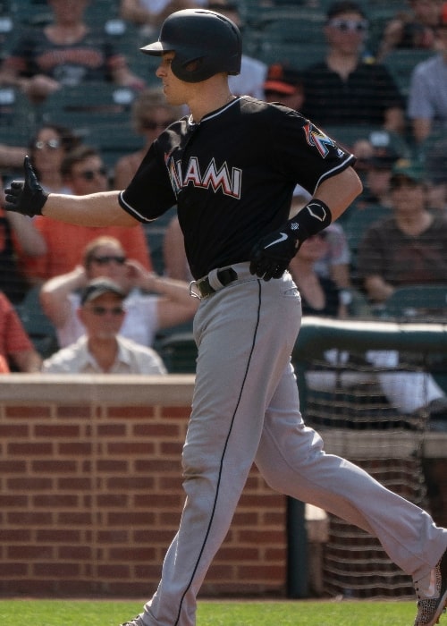 J. T. Realmuto as seen with the Miami Marlins crossing home plate during a game against the Baltimore Orioles at Oriole Park at Camden Yards on June 16, 2018