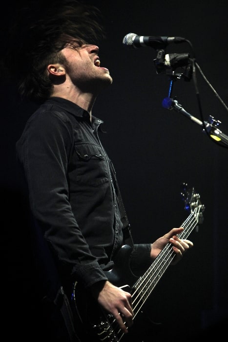 Michael Shuman as seen while performing with Queens of the Stone Age in July 2011