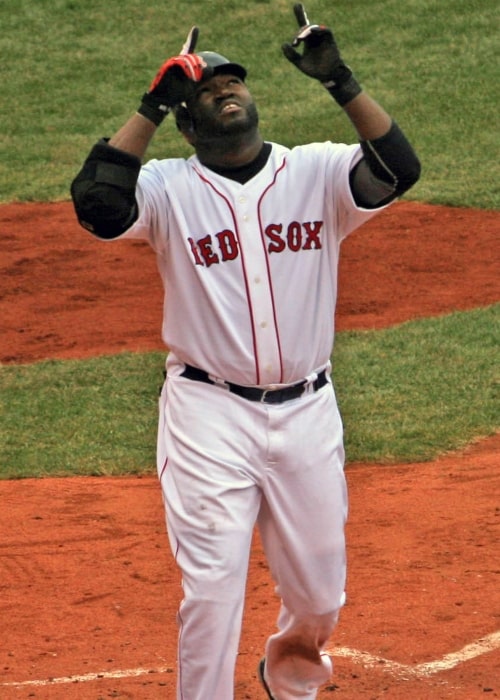 David Ortiz of the Boston Red Sox points to his own name after hitting a home run in 2007