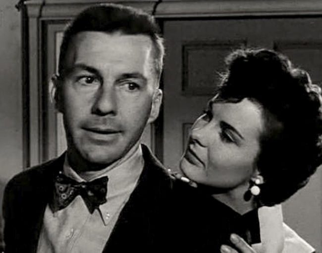 David Wayne as seen with Jean Peters in the trailer for the 1951 film As Young as You Feel