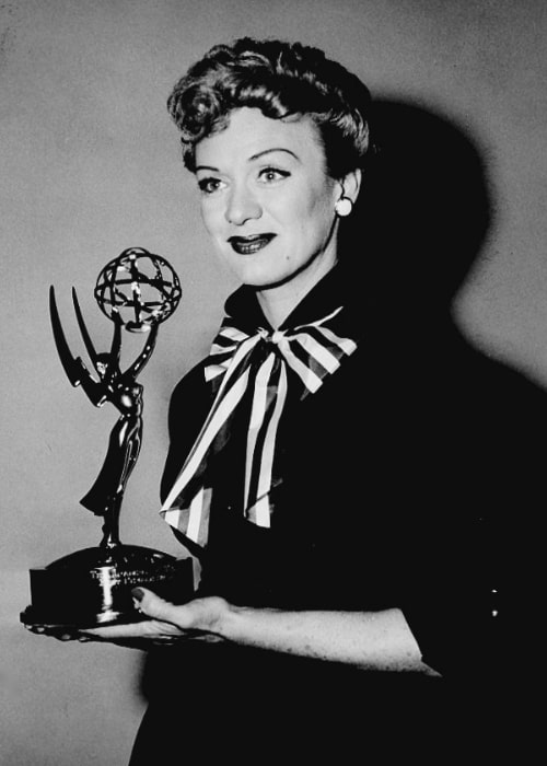 Eve Arden as seen while smiling in a picture with her Emmy Award for 'Our Miss Brooks' on February 11, 1954