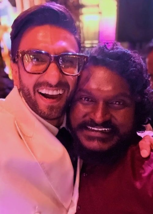 Jagadeesh Prathap Bandari (Right) as seen while smiling for a picture with Ranveer Singh in July 2023