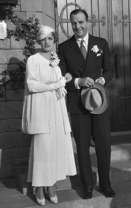 Louis Calhern and Natalie Schafer as seen in their wedding photograph taken at Wee Kirk o' the Heather chapel at Forest Lawn in Glendale, California in 1933