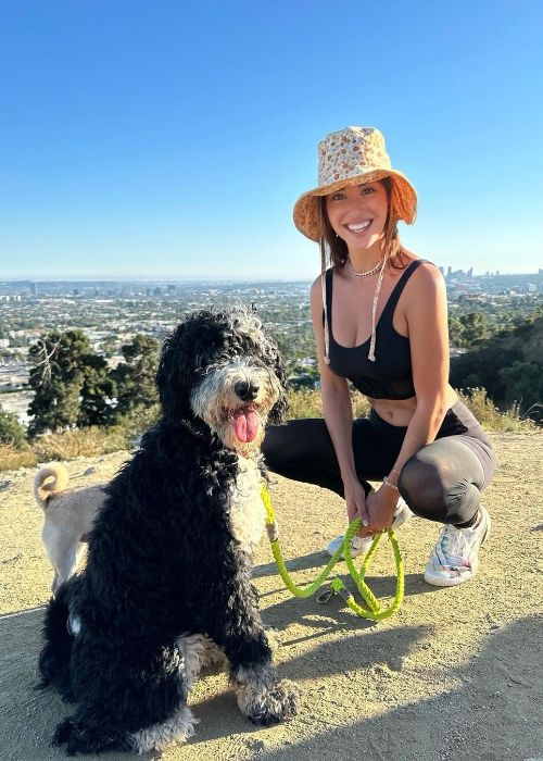 Melissa Bolona as seen in an Instagram picture with her pet dog Paloma in August 2023