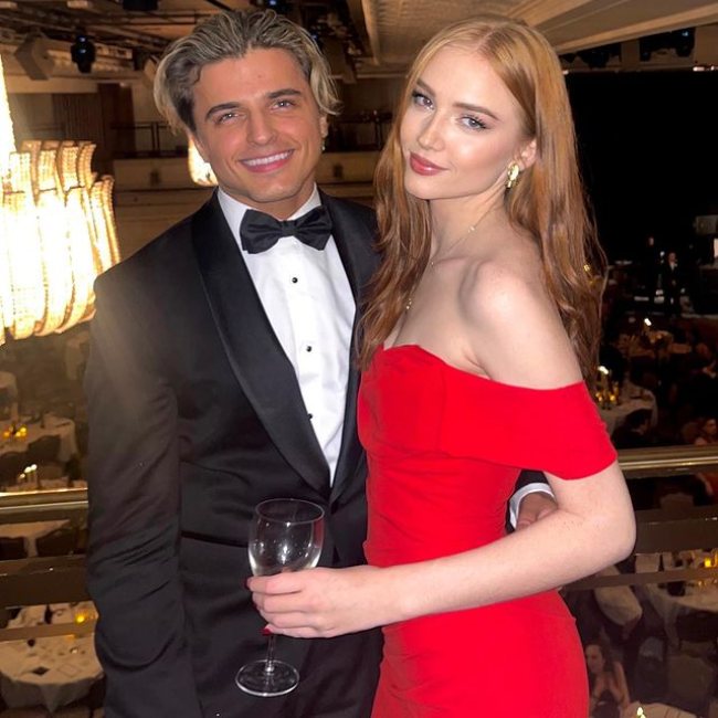 Nikita Kuzmin as seen posing with his girlfriend Lauren Jaine in November 2023