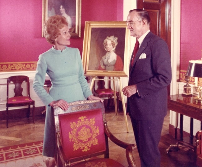 Pat Nixon as seen in the White House Red Room with White House curator Clem Conger in 1971