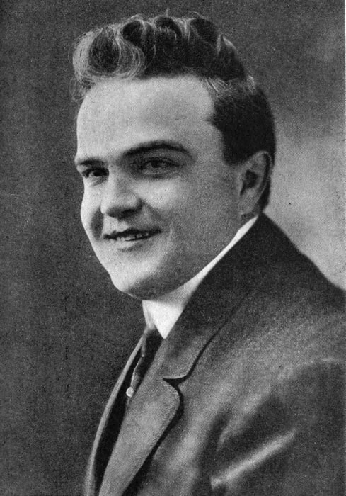 Victor Moore as seen while smiling in a still, circa 1908