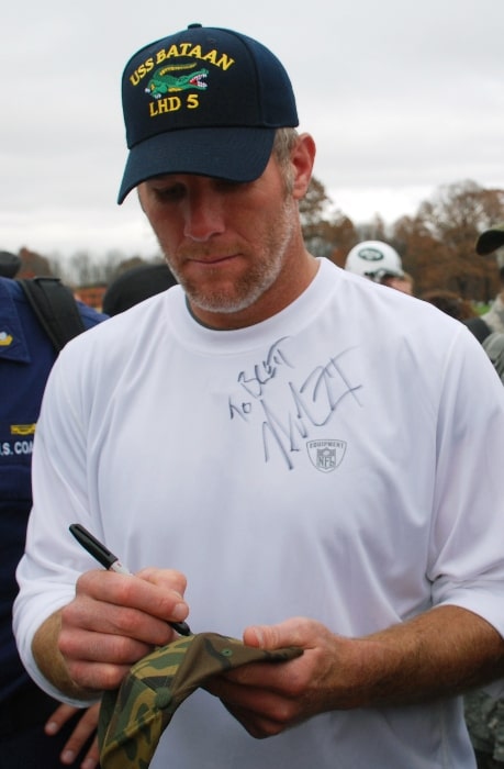 Brett Favre as seen while signing an autograph for Storekeeper 1st Class Louis Lopez, a recruiter assigned to Navy Recruiting District New York, in Florham Park in 2008