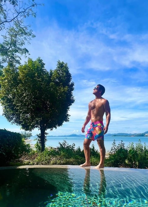 Johnno Wilson as seen while posing shirtless for the camera at The Naka Island, a Luxury Collection Resort & Spa in Phuket, Thailand in December 2023
