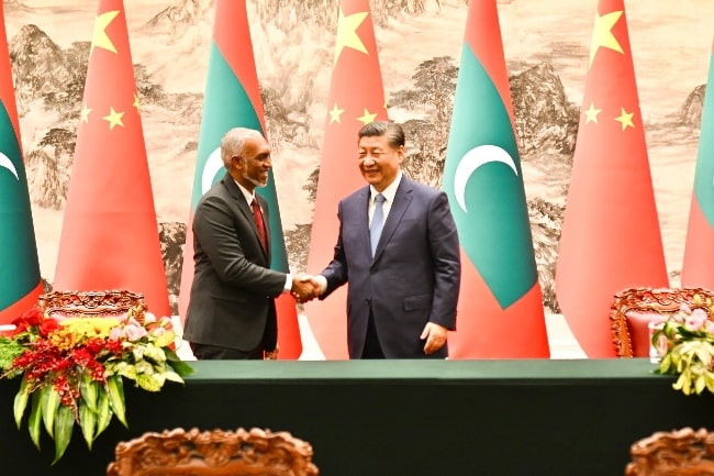 Mohamed Muizzu (Left) as seen while meeting Xi Jinping in January 2024