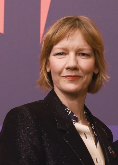 Sandra Hüller as seen while smiling for the camera at Berlinale 2023