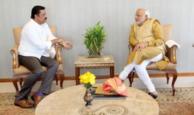 Suresh Gopi (Left) as seen during a meeting with Prime Minister Narendra Modi in 2014