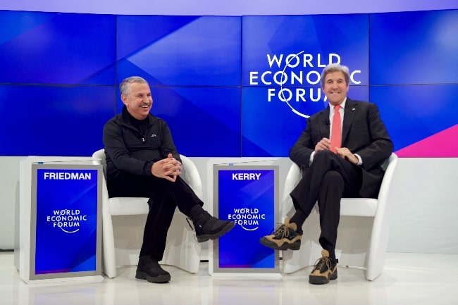Thomas Friedman (Left) as seen with U.S. Secretary of State John Kerry at the World Economic Forum in Davos, Switzerland in 2017