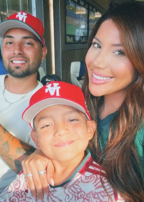 Victor Hallman as seen in a selfie with his beau Laura Mellado and their son Elliott that was taken in July 2023