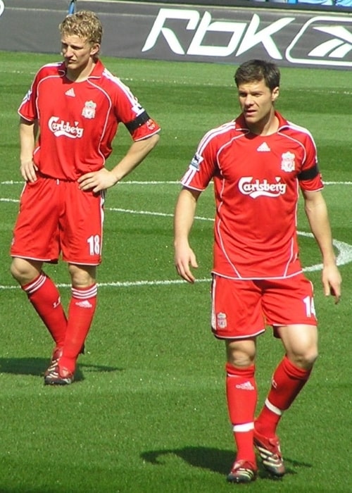 Xabi Alonso (Right) and Dirk Kuyt as seen while playing for Liverpool in April 2007