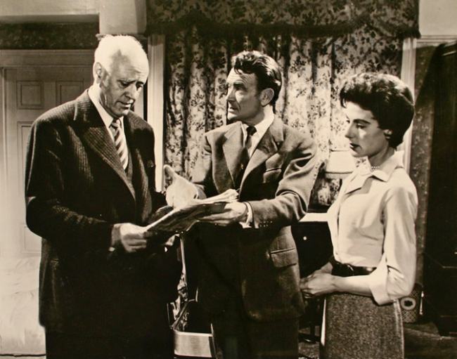 Alastair Sim (left) seen with John Mills and Yvonne Mitchell in the 1955 comedy-thriller Escapade
